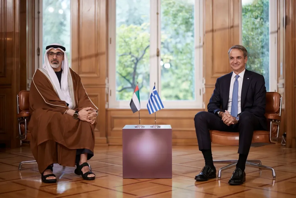 Kyriakos Mitsotakis and Abu Dhabi Crown Prince Sheikh Khaled meet beside Greek and UAE flags in Athens on October 22, 2026.