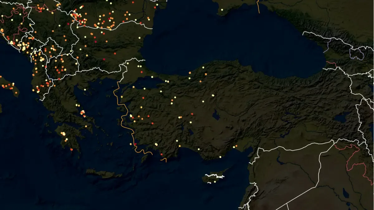 Wildfire smoke rising over dry vegetation as Türkiye and Greece increase readiness across the Aegean region