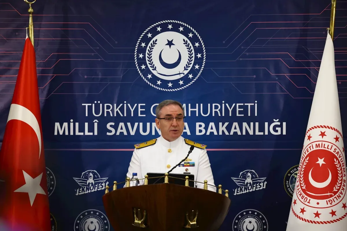 Rear Admiral Zeki Aktürk speaks at the weekly Turkish Defense Ministry briefing at Gölcük Shipyard Command during TEKNOFEST Mavi Vatan