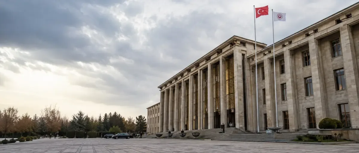 Turkish parliament building in Ankara under cloudy skies